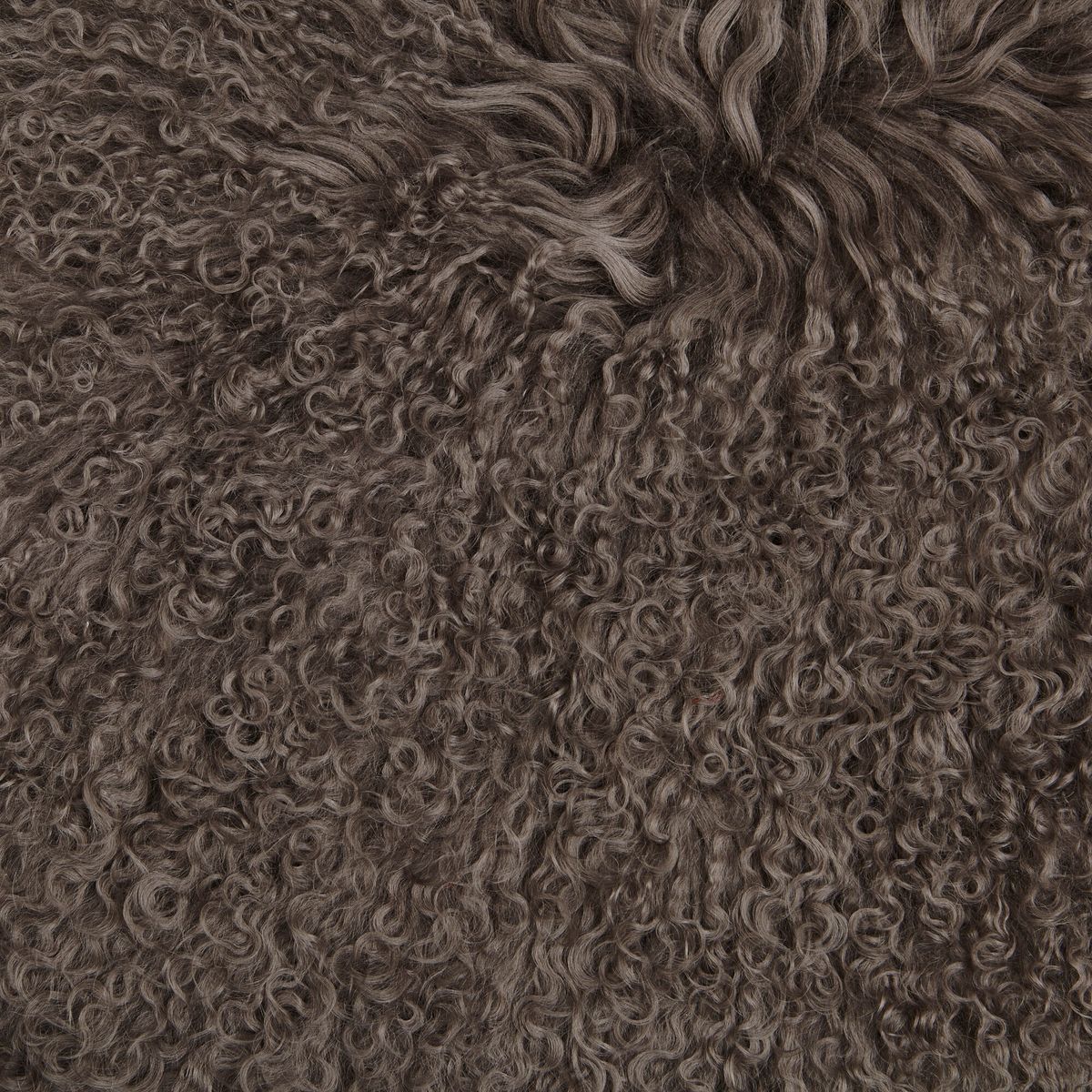 Schaukelstuhl mit tibetischem Bezug