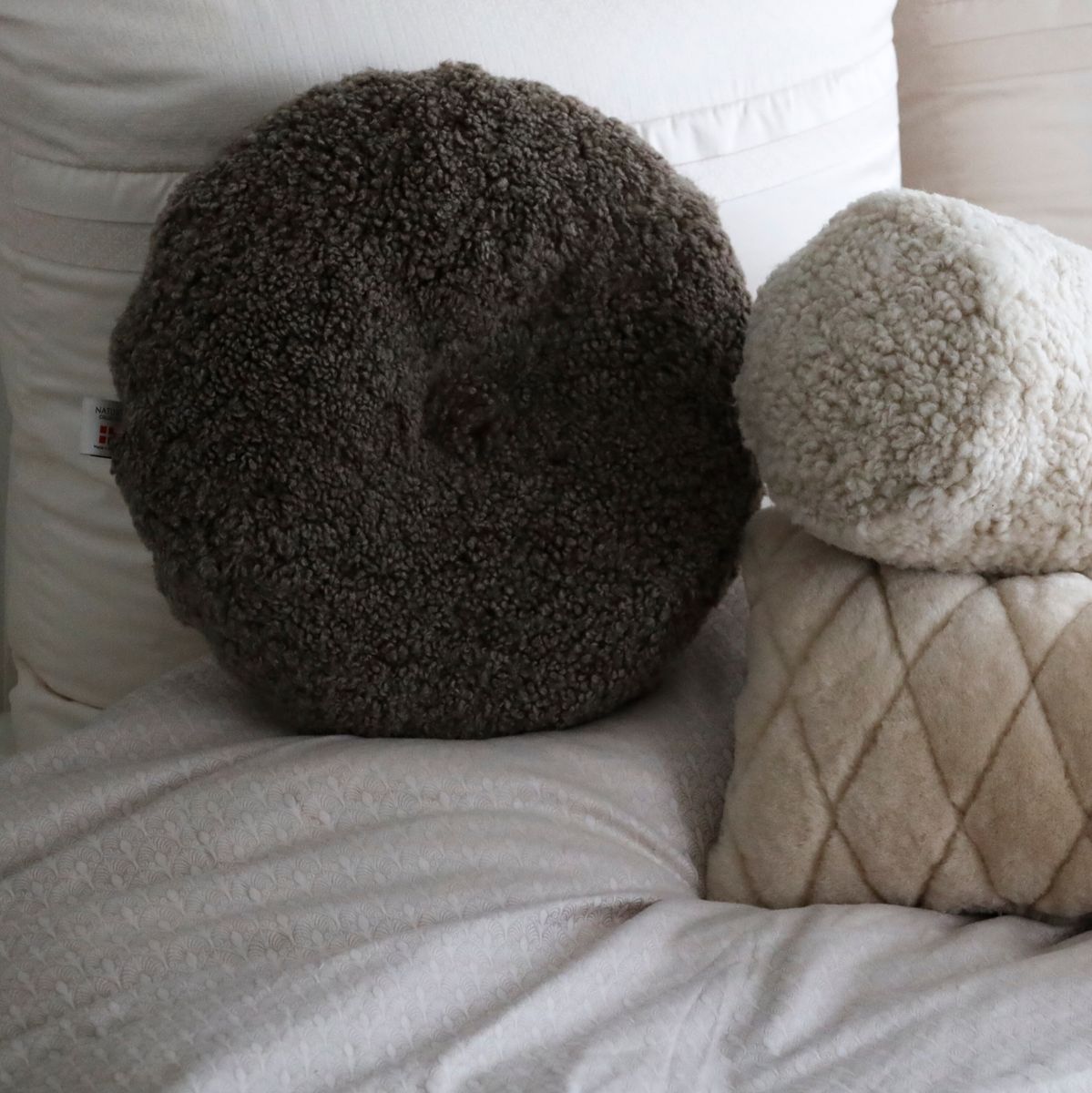 Lammfellkissen | Kurzhaarig | Neuseeland | Doppelseitig | D40 cm